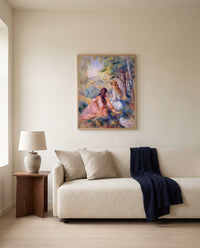 In the Meadow by Pierre-Auguste Renoir framed in natural oak above a cream sofa in a warm living room