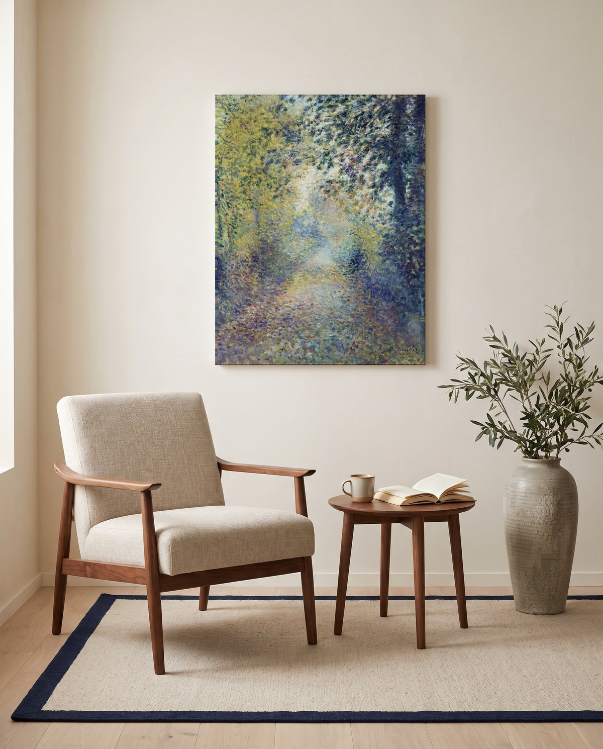In the Woods by Pierre-Auguste Renoir as a stretched canvas above a linen lounge chair in a reading corner