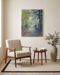 In the Woods by Pierre-Auguste Renoir as a stretched canvas above a linen lounge chair in a reading corner