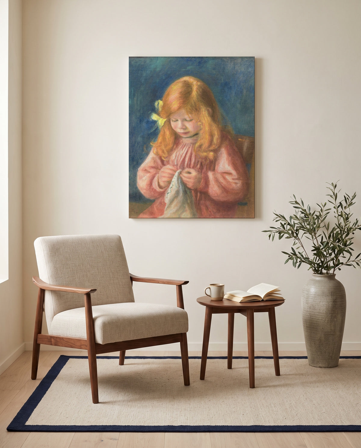 Jean Renoir Sewing by Pierre-Auguste Renoir as a stretched canvas above a linen lounge chair in a reading corner