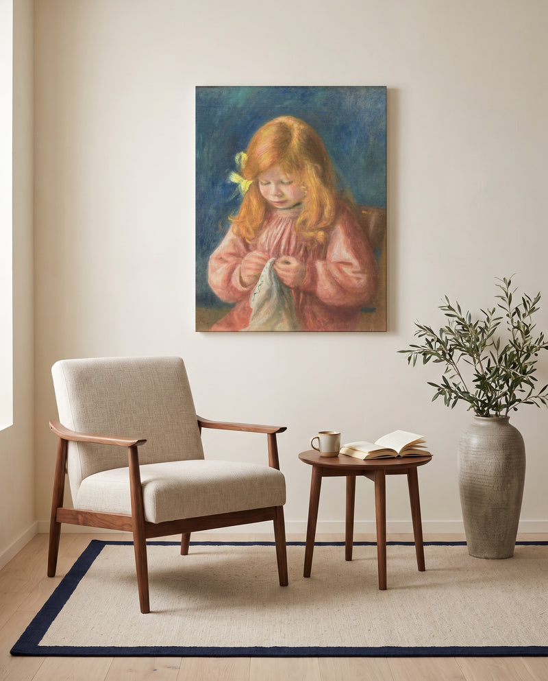 Jean Renoir Sewing by Pierre-Auguste Renoir as a stretched canvas above a linen lounge chair in a reading corner