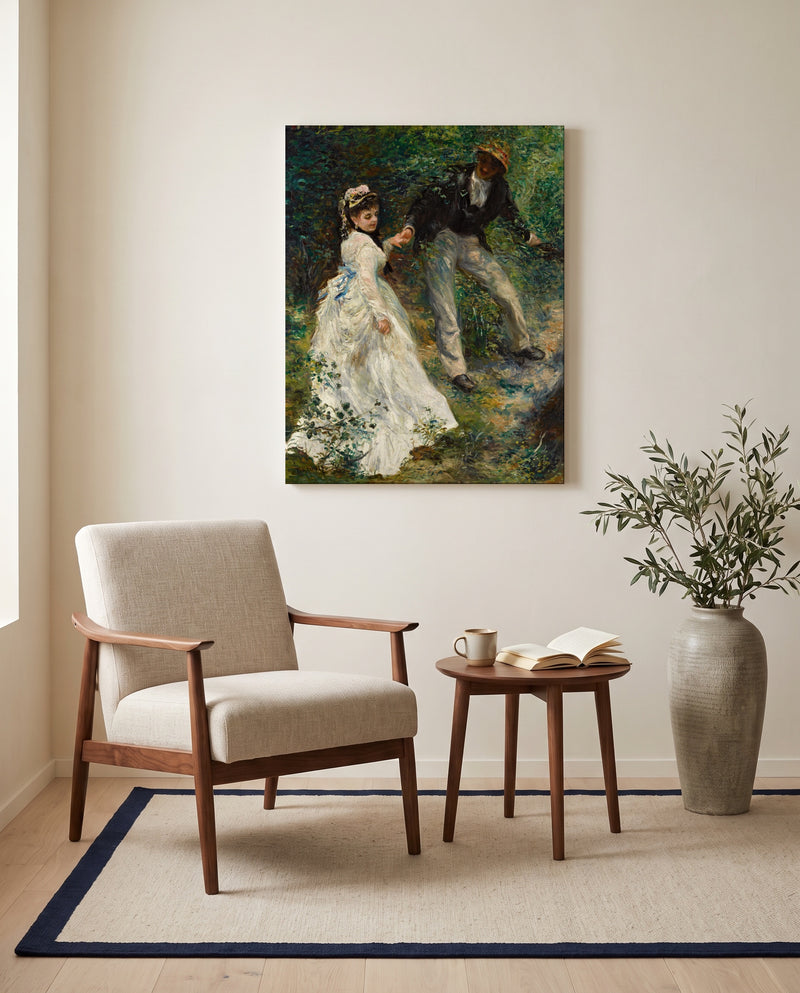 La Promenade by Pierre-Auguste Renoir as a stretched canvas above a linen lounge chair in a reading corner