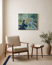 Lunch at the Restaurant Fournaise by Renoir as a stretched canvas above a linen lounge chair in a reading corner