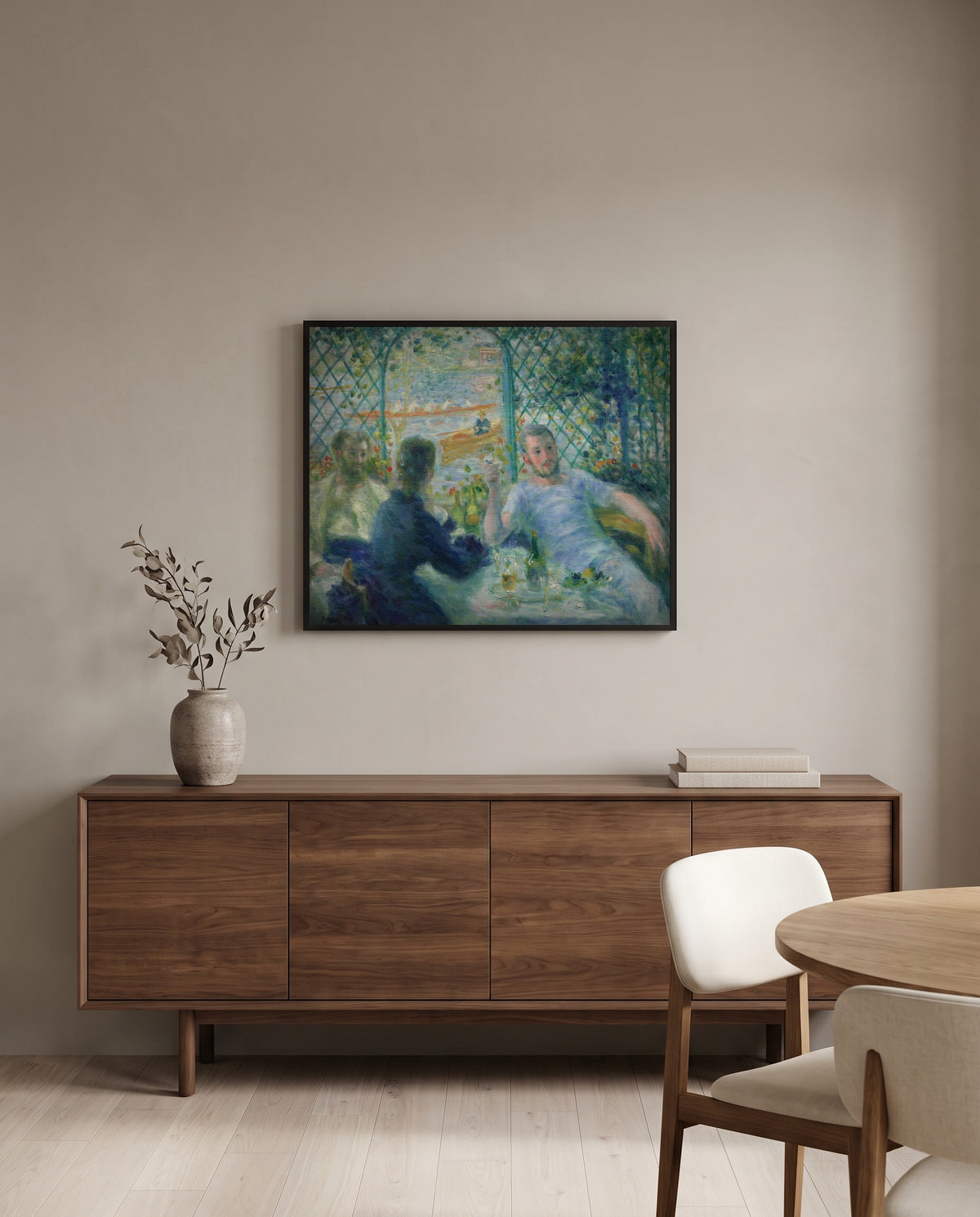 Lunch at the Restaurant Fournaise by Pierre-Auguste Renoir in a black frame above a walnut sideboard in a dining room