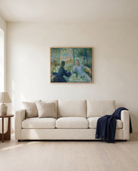 Lunch at the Restaurant Fournaise by Pierre-Auguste Renoir framed in natural oak above a cream sofa in a warm living room