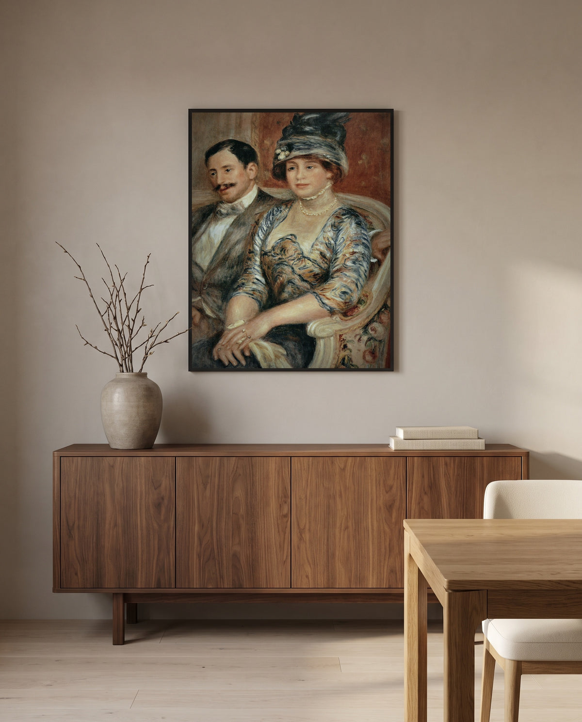 Mr and Mrs Bernheim by Pierre-Auguste Renoir in a black frame above a walnut sideboard in a dining room