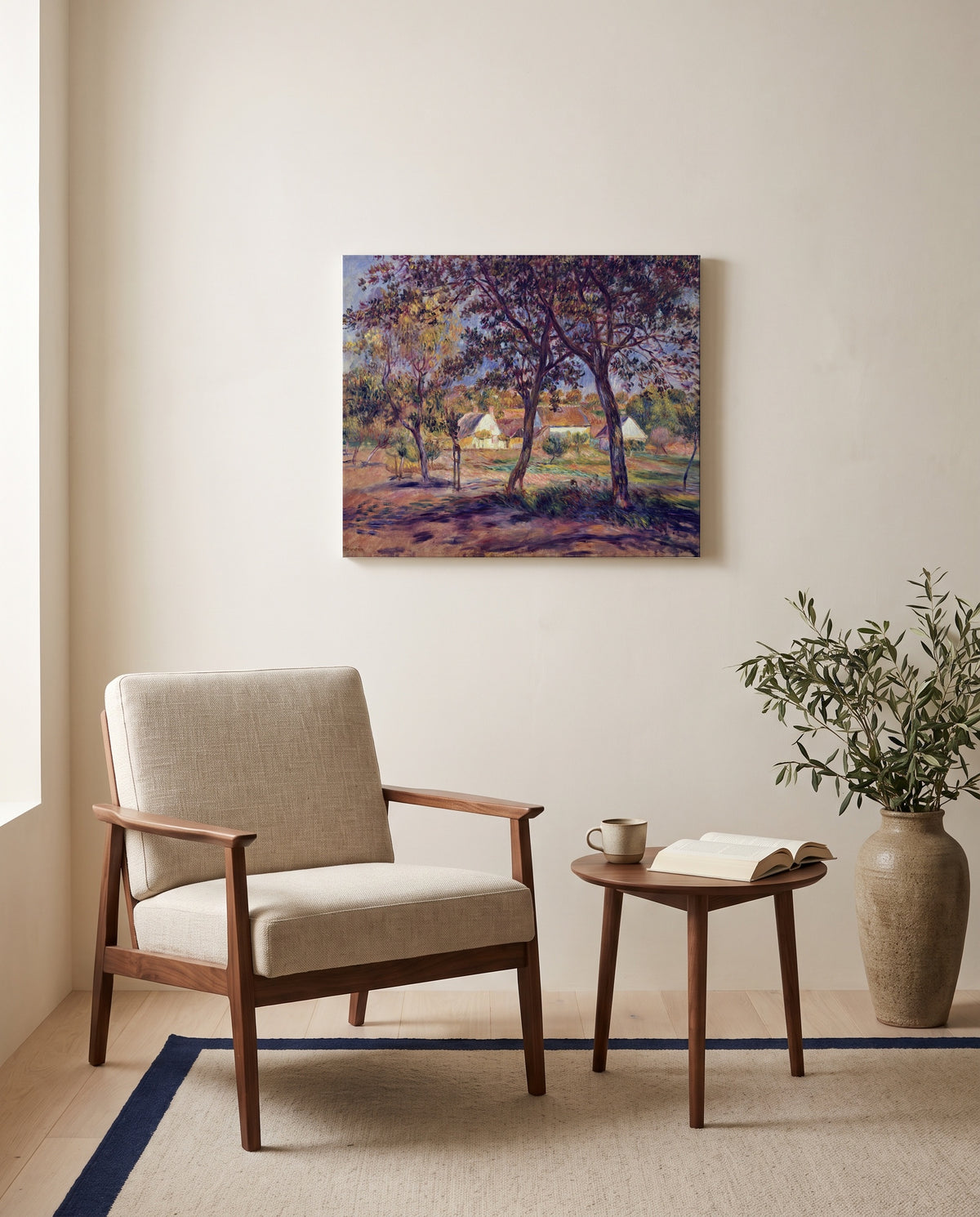 Outskirts of Pont-Aven by Pierre-Auguste Renoir as a stretched canvas above a linen lounge chair in a reading corner