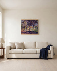 Outskirts of Pont-Aven by Pierre-Auguste Renoir framed in natural oak above a cream sofa in a warm living room