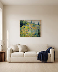 Path through Tall Grass by Pierre-Auguste Renoir framed in natural oak above a cream sofa in a warm living room