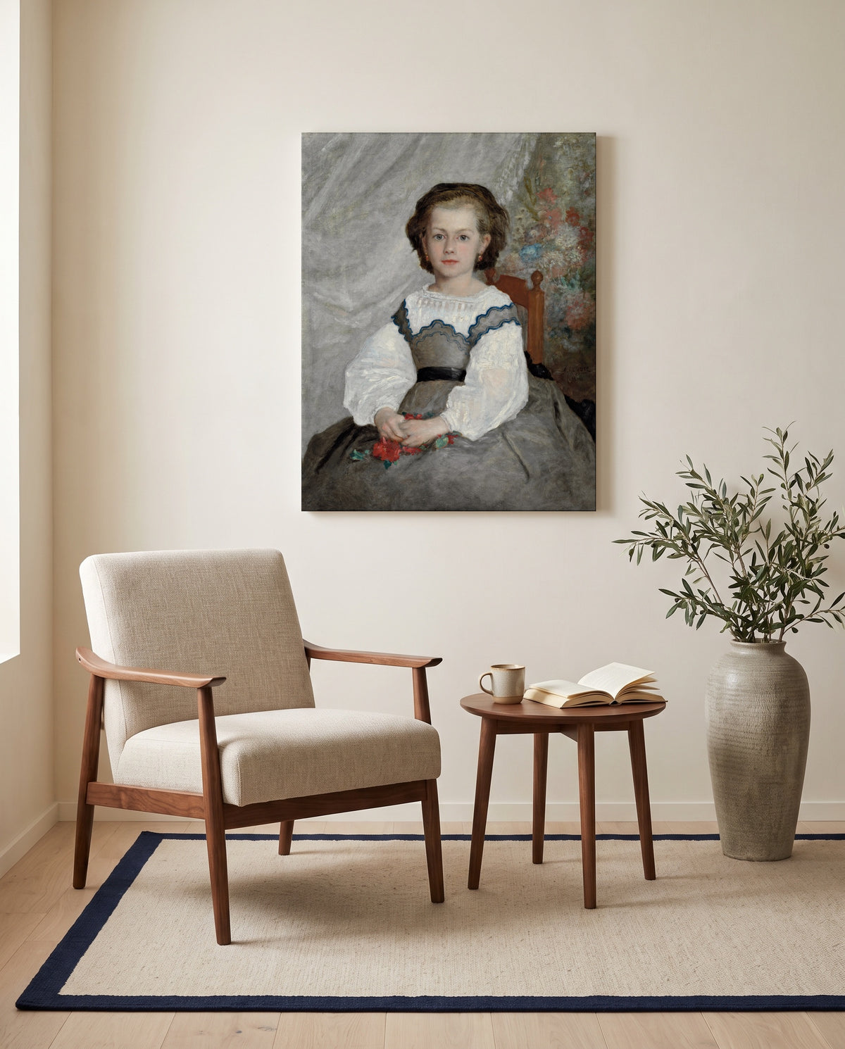 Romaine Lacaux by Pierre-Auguste Renoir as a stretched canvas above a linen lounge chair in a reading corner