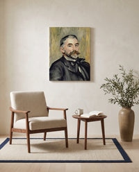 Stéphane Mallarmé by Pierre-Auguste Renoir as a stretched canvas above a linen lounge chair in a reading corner