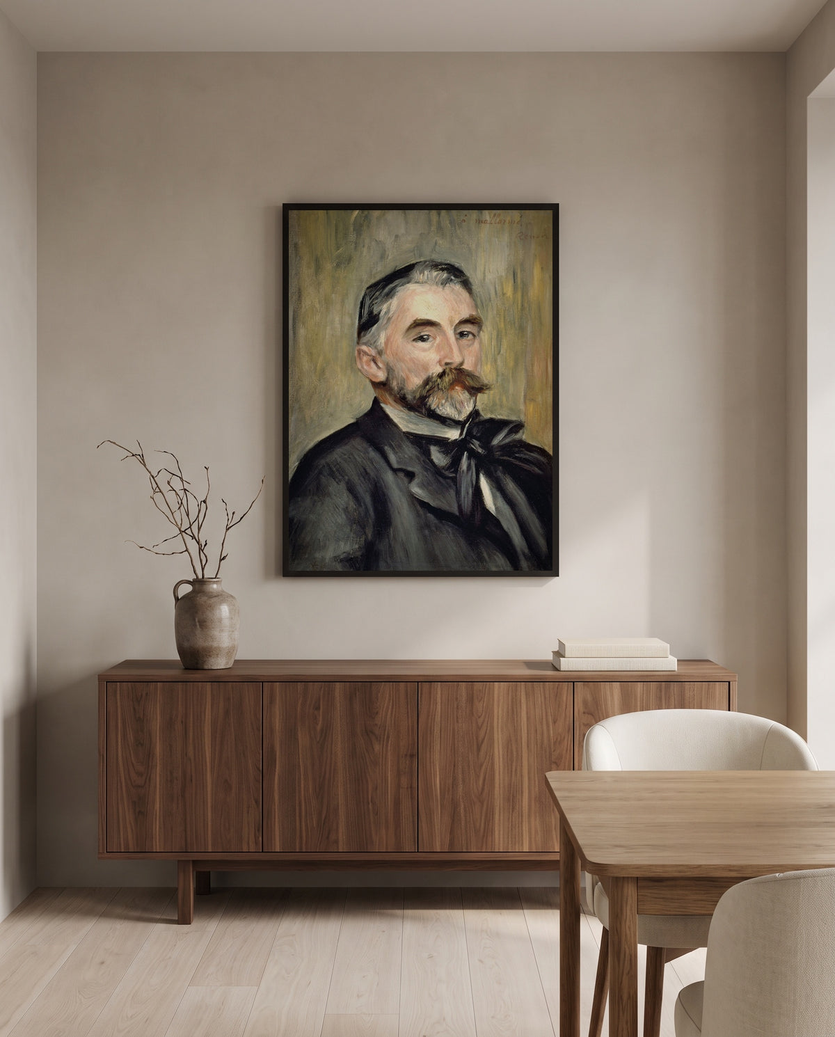 Stéphane Mallarmé by Pierre-Auguste Renoir in a black frame above a walnut sideboard in a dining room