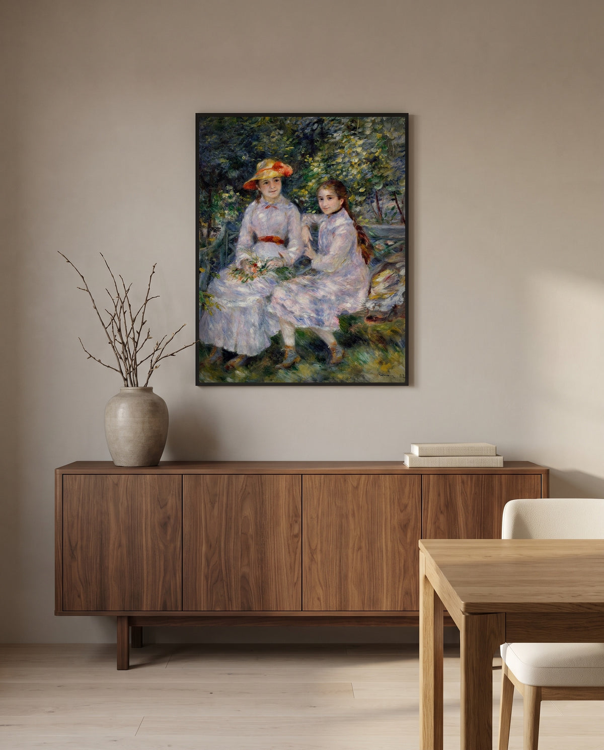 Durand-Ruel Daughters by Pierre-Auguste Renoir in a black frame above a walnut sideboard in a dining room
