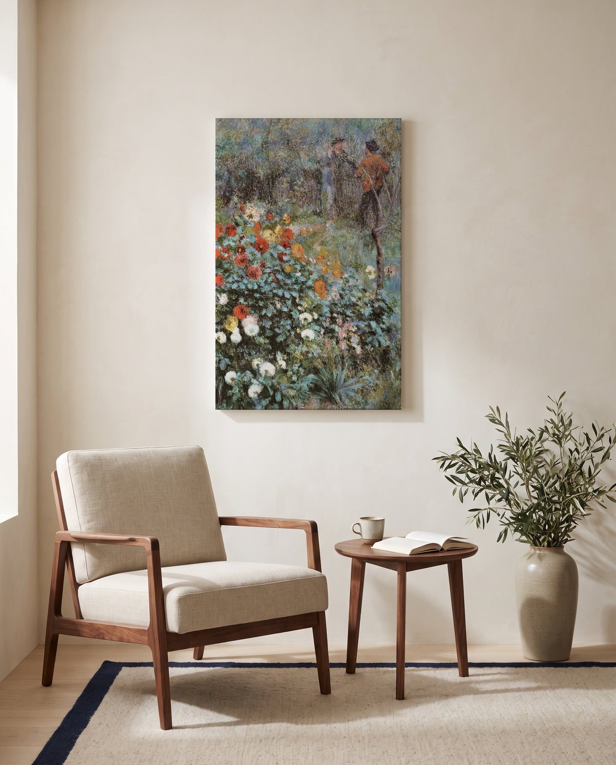 Garden in the Rue Cortot by Pierre-Auguste Renoir as a stretched canvas above a linen lounge chair in a reading corner