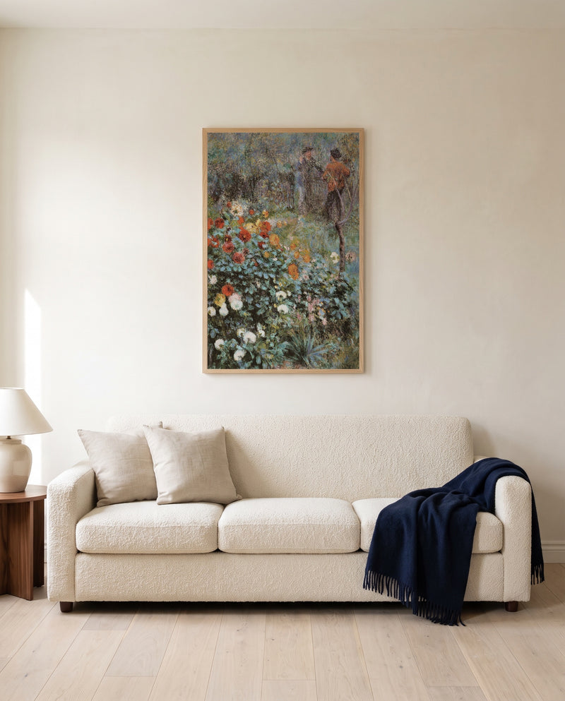 Garden in the Rue Cortot by Pierre-Auguste Renoir framed in natural oak above a cream sofa in a warm living room
