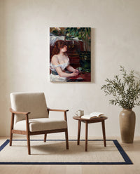 The Green Jardinière by Pierre-Auguste Renoir as a stretched canvas above a linen lounge chair in a reading corner