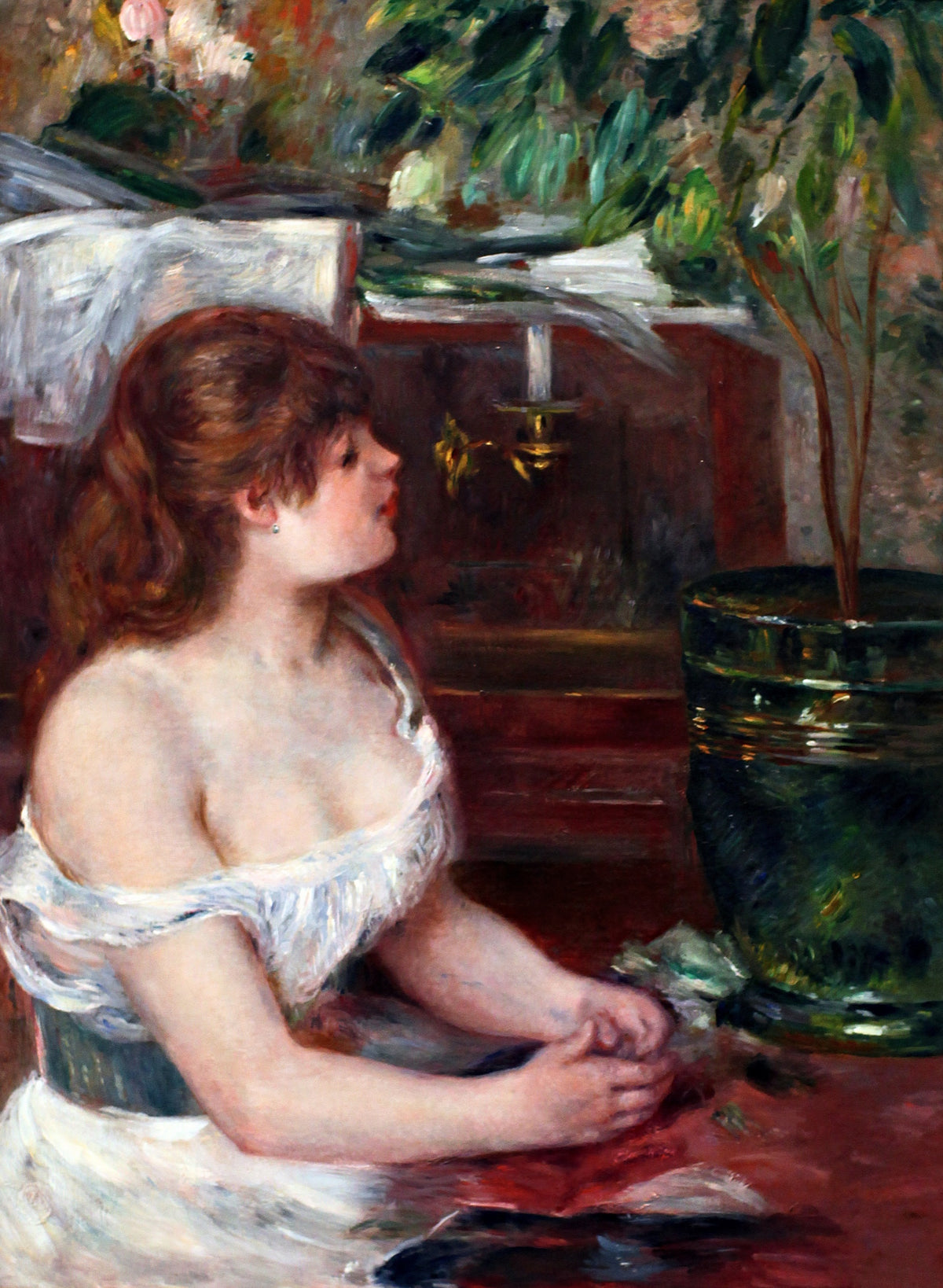 The Green Jardinière by Renoir: a young woman with red hair in a white off-shoulder dress seated by a dark green planter