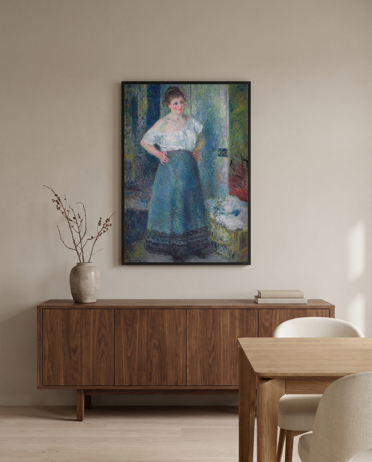 The Laundress by Pierre-Auguste Renoir in a black frame above a walnut sideboard in a dining room