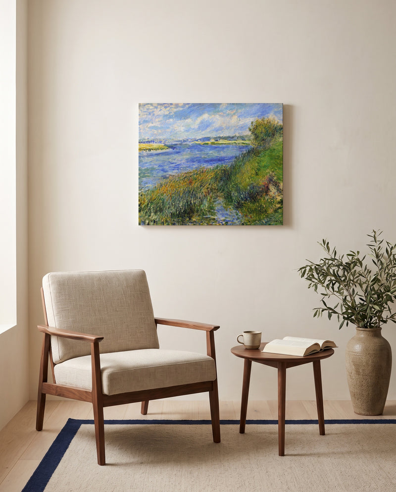 The Seine at Champrosay by Pierre-Auguste Renoir as a stretched canvas above a linen lounge chair in a reading corner