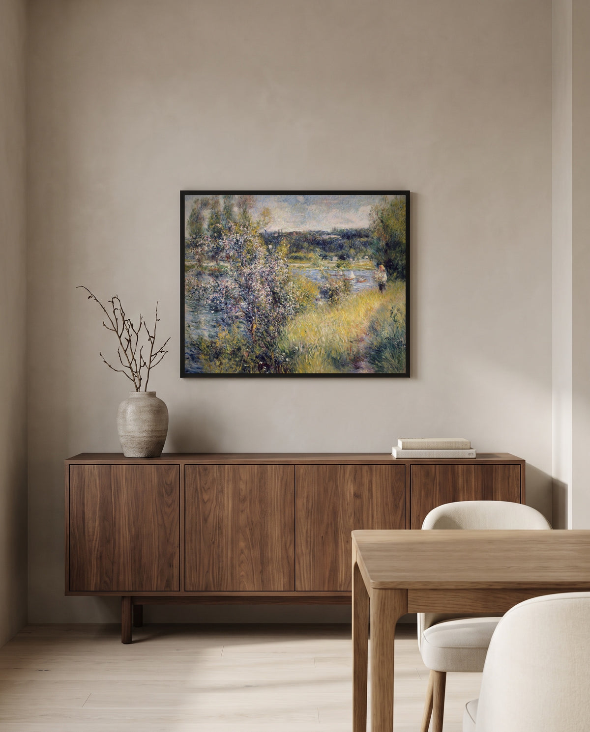 The Seine at Chatou by Pierre-Auguste Renoir in a black frame above a walnut sideboard in a dining room