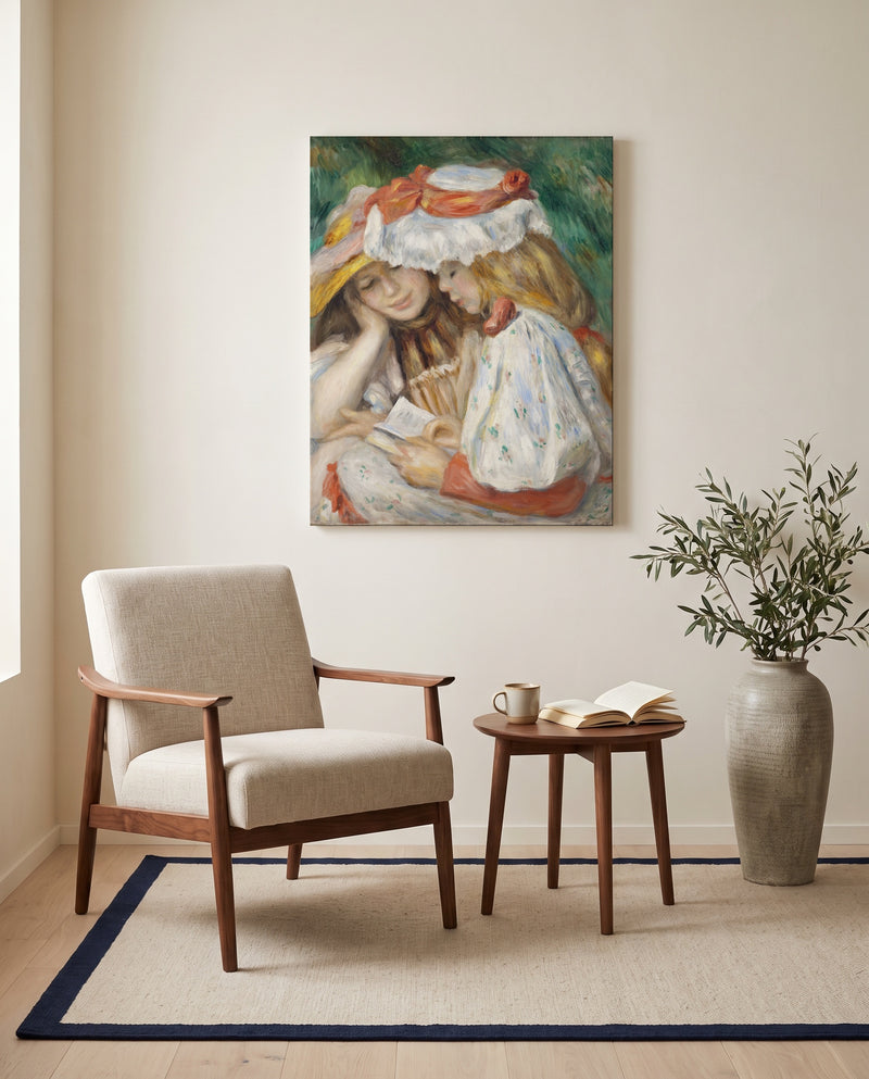 Two Girls Reading by Pierre-Auguste Renoir as a stretched canvas above a linen lounge chair in a reading corner