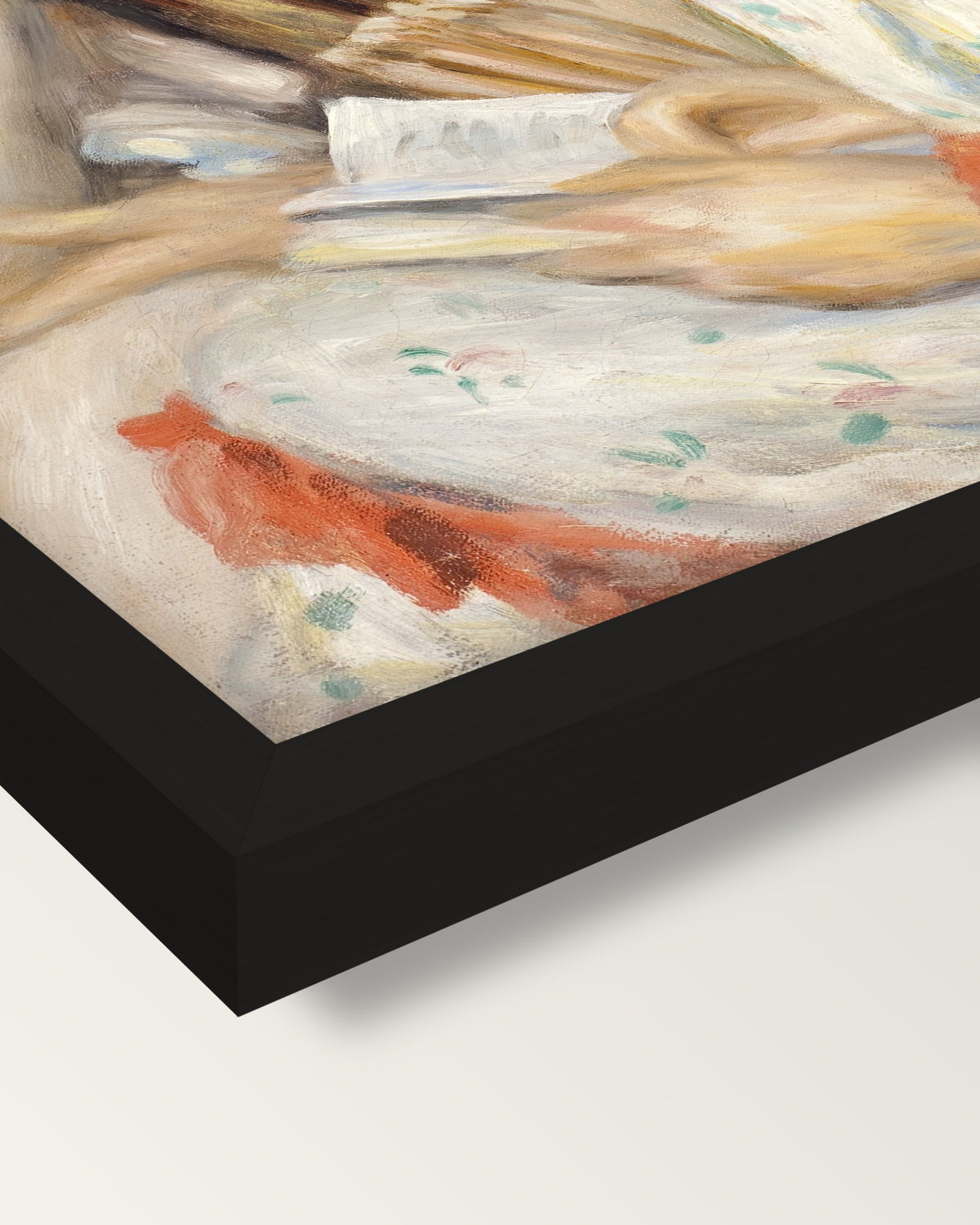 Two Girls Reading by Renoir framed print, corner close-up: black moulding, mitred, the print set just below its edge
