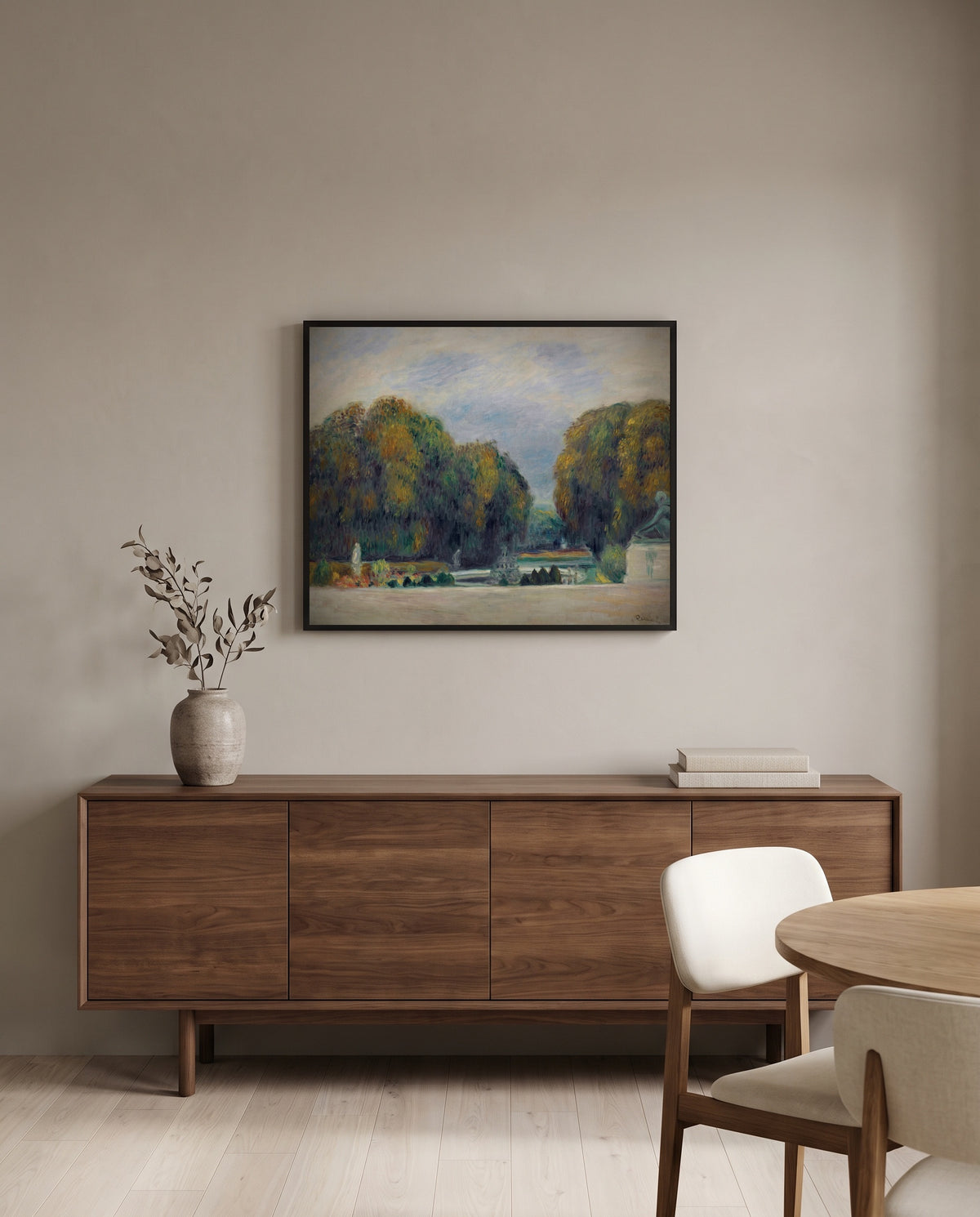 Versailles by Pierre-Auguste Renoir in a black frame above a walnut sideboard in a dining room