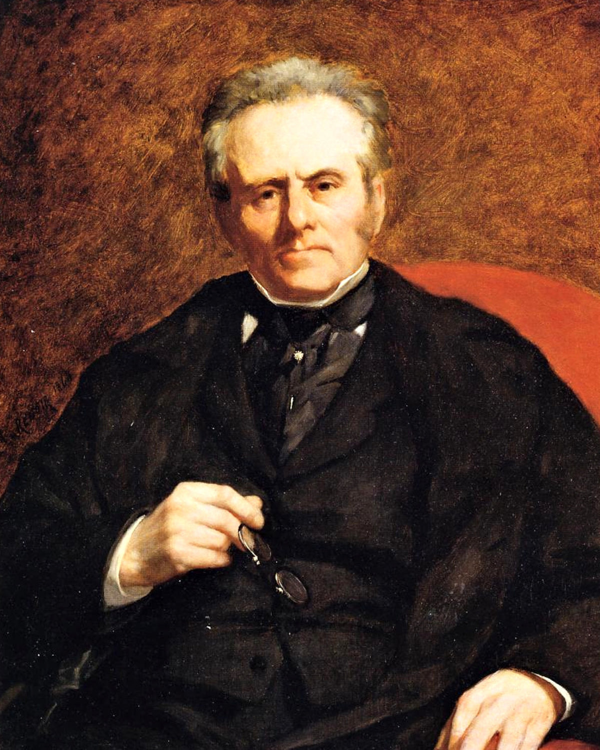 William Sisley by Renoir: an elderly man with white hair in a black suit sits in a red armchair, holding his spectacles