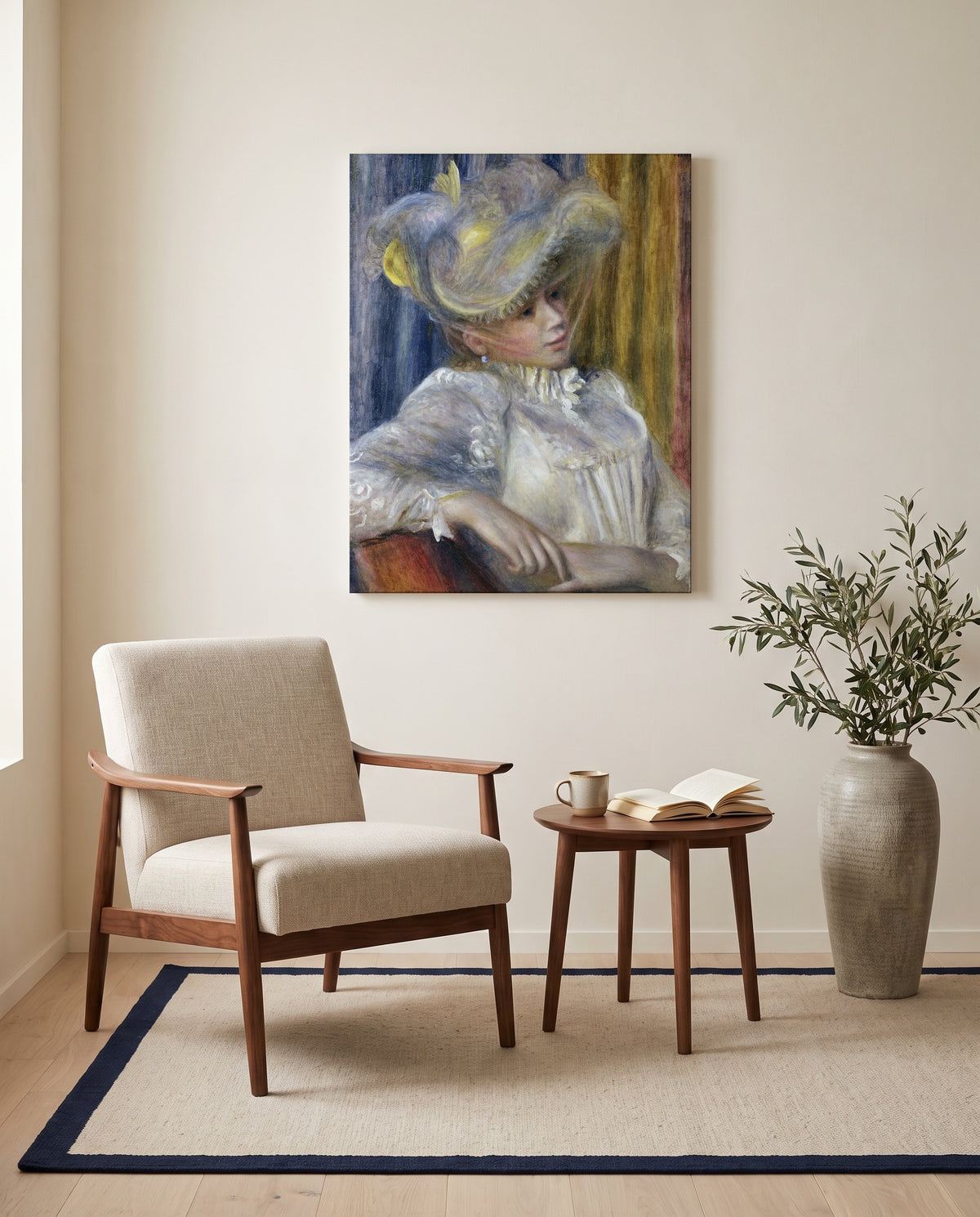 Woman with a Hat by Pierre-Auguste Renoir as a stretched canvas above a linen lounge chair in a reading corner