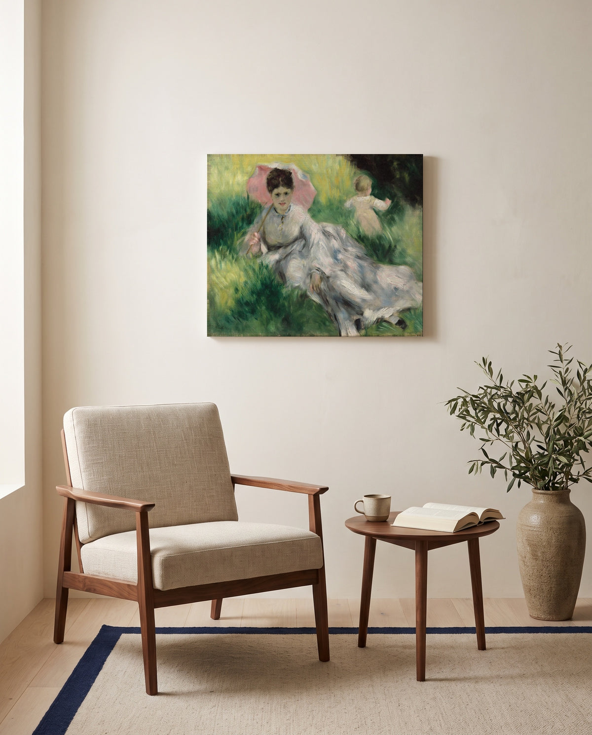 Woman with Parasol and Child by Pierre-Auguste Renoir as a stretched canvas above a linen lounge chair in a reading corner