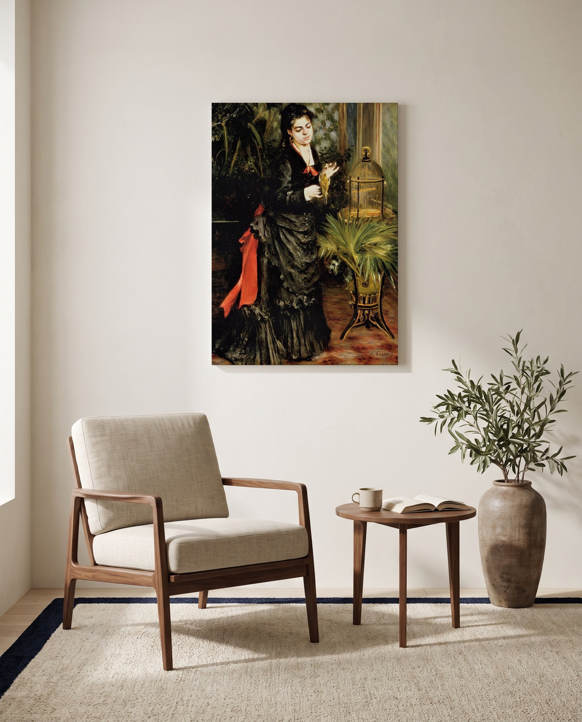 Woman with a Parrot by Pierre-Auguste Renoir as a stretched canvas above a linen lounge chair in a reading corner