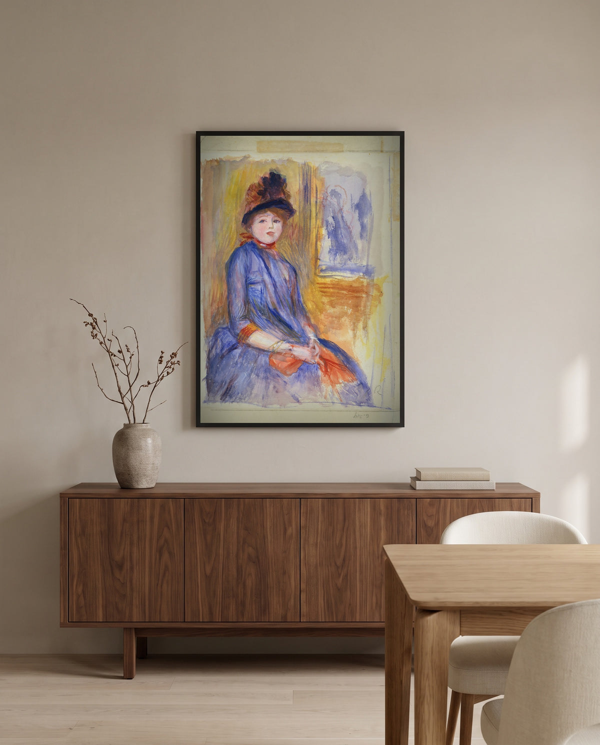 Young Girl in a Blue Dress by Pierre-Auguste Renoir in a black frame above a walnut sideboard in a dining room