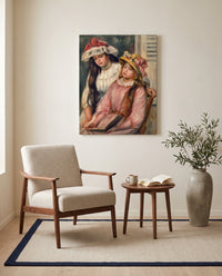 Girls Looking at an Album by Pierre-Auguste Renoir as a stretched canvas above a linen lounge chair in a reading corner
