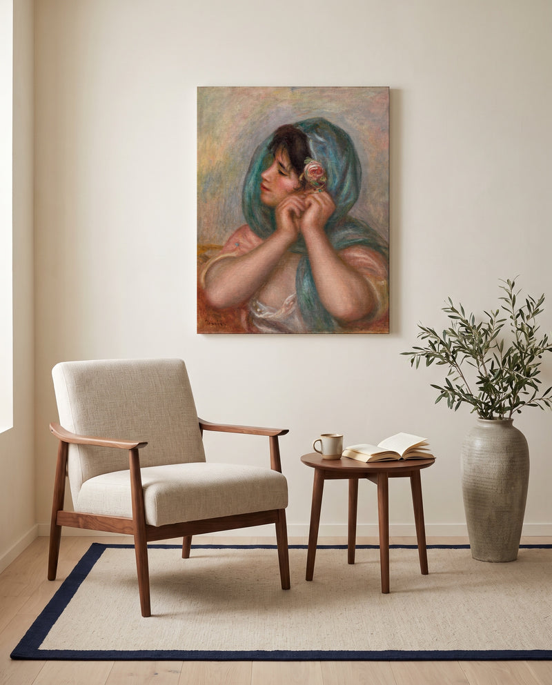 Young Woman Arranging Her Earring by Renoir as a stretched canvas above a linen lounge chair in a reading corner