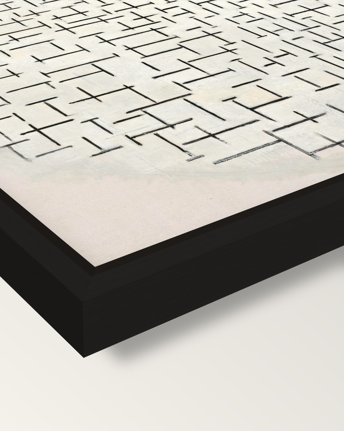 Composition 10 by Piet Mondrian framed canvas, corner close-up: a black floating frame with a shadow gap round the canvas