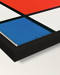 Composition II by Piet Mondrian framed canvas, corner close-up: a black floating frame with a shadow gap round the canvas