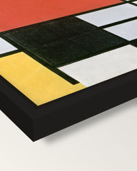 Large Red Plane by Piet Mondrian framed canvas, corner close-up: a black floating frame with a shadow gap round the canvas