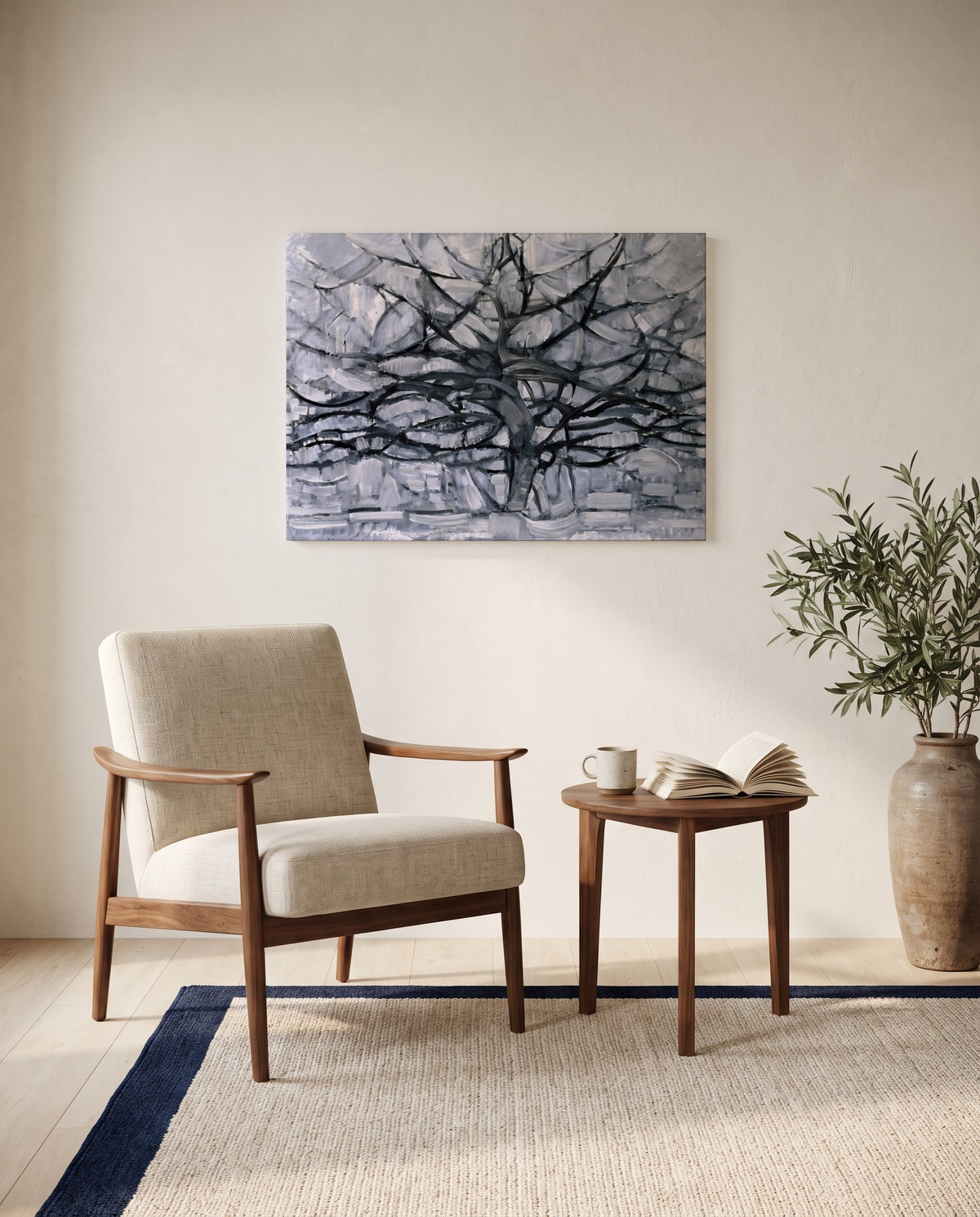Gray Tree by Piet Mondrian as a stretched canvas above a linen lounge chair in a reading corner