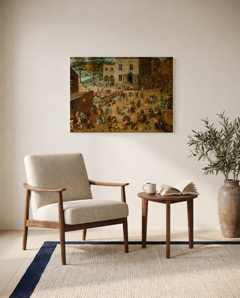 Children’s Games by Pieter Bruegel the Elder as a stretched canvas above a linen lounge chair in a reading corner