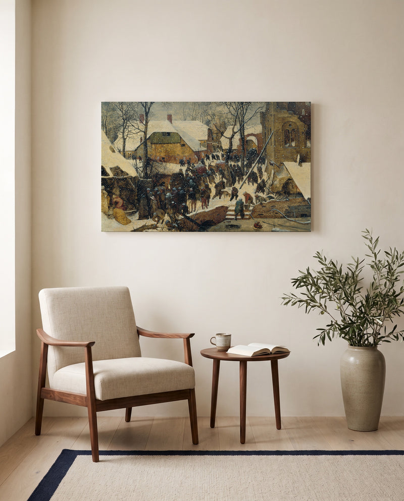 Adoration in the Snow by Pieter Bruegel the Elder as a stretched canvas above a linen lounge chair in a reading corner