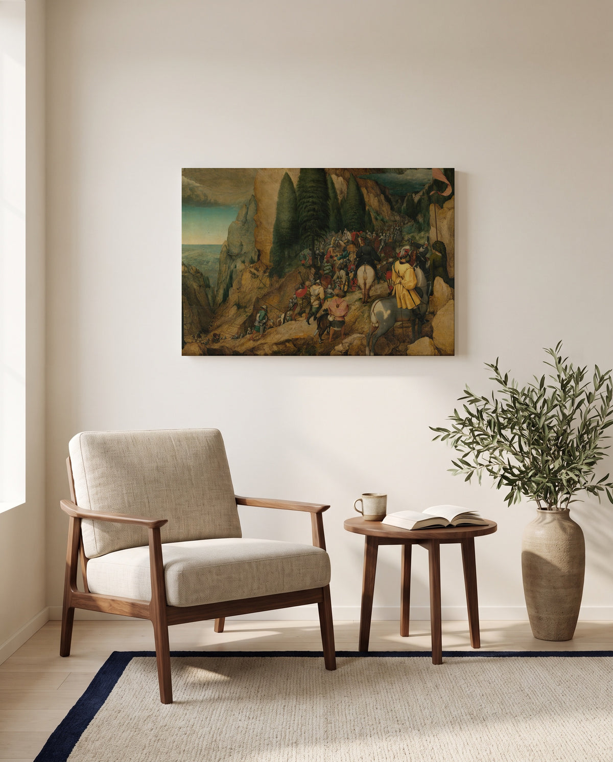 The Conversion of Paul by Pieter Bruegel the Elder as a stretched canvas above a linen lounge chair in a reading corner