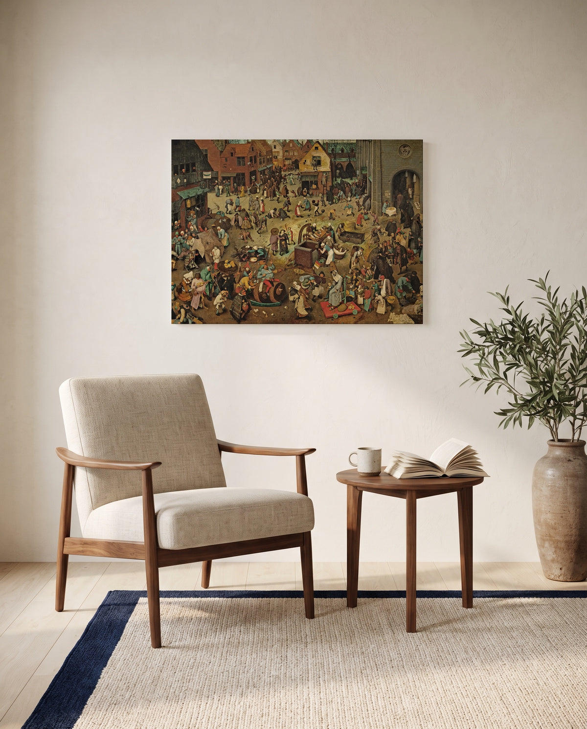 Carnival and Lent by Pieter Bruegel the Elder as a stretched canvas above a linen lounge chair in a reading corner
