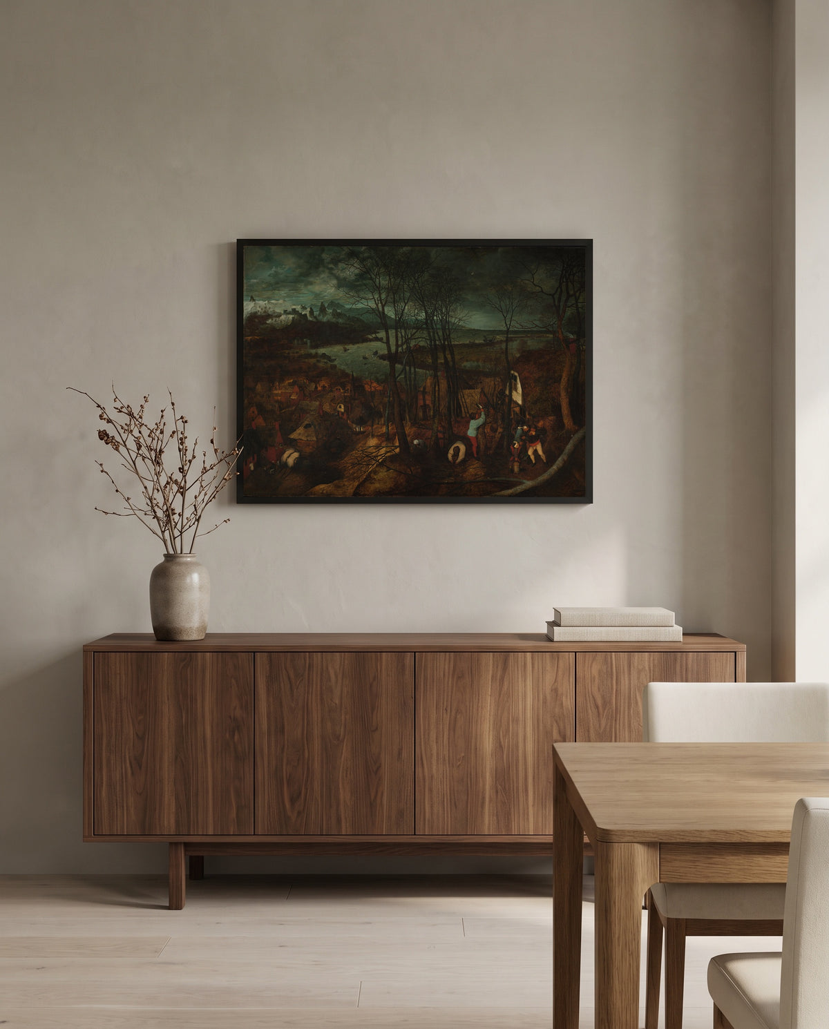 The Gloomy Day by Pieter Bruegel the Elder in a black frame above a walnut sideboard in a dining room