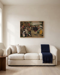 The Peasant Dance by Pieter Bruegel the Elder framed in natural oak above a cream sofa in a warm living room