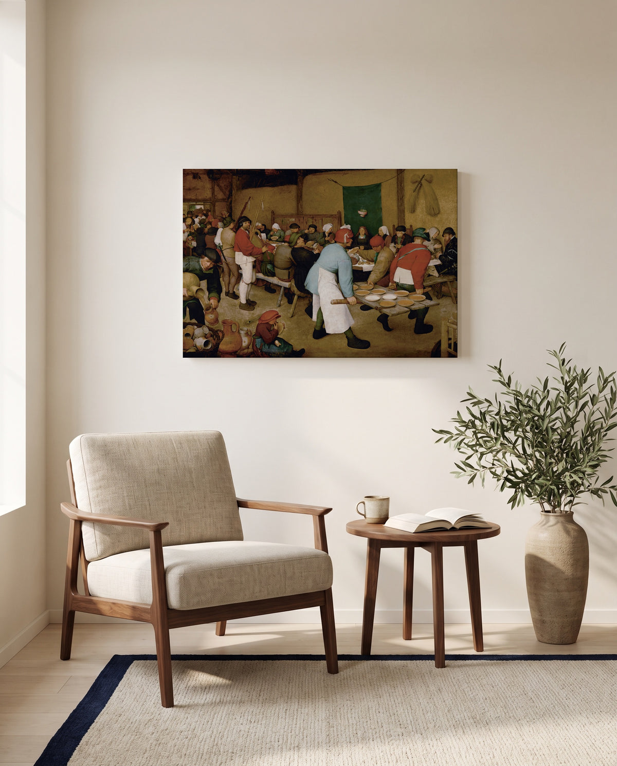 The Peasant Wedding by Pieter Bruegel the Elder as a stretched canvas above a linen lounge chair in a reading corner