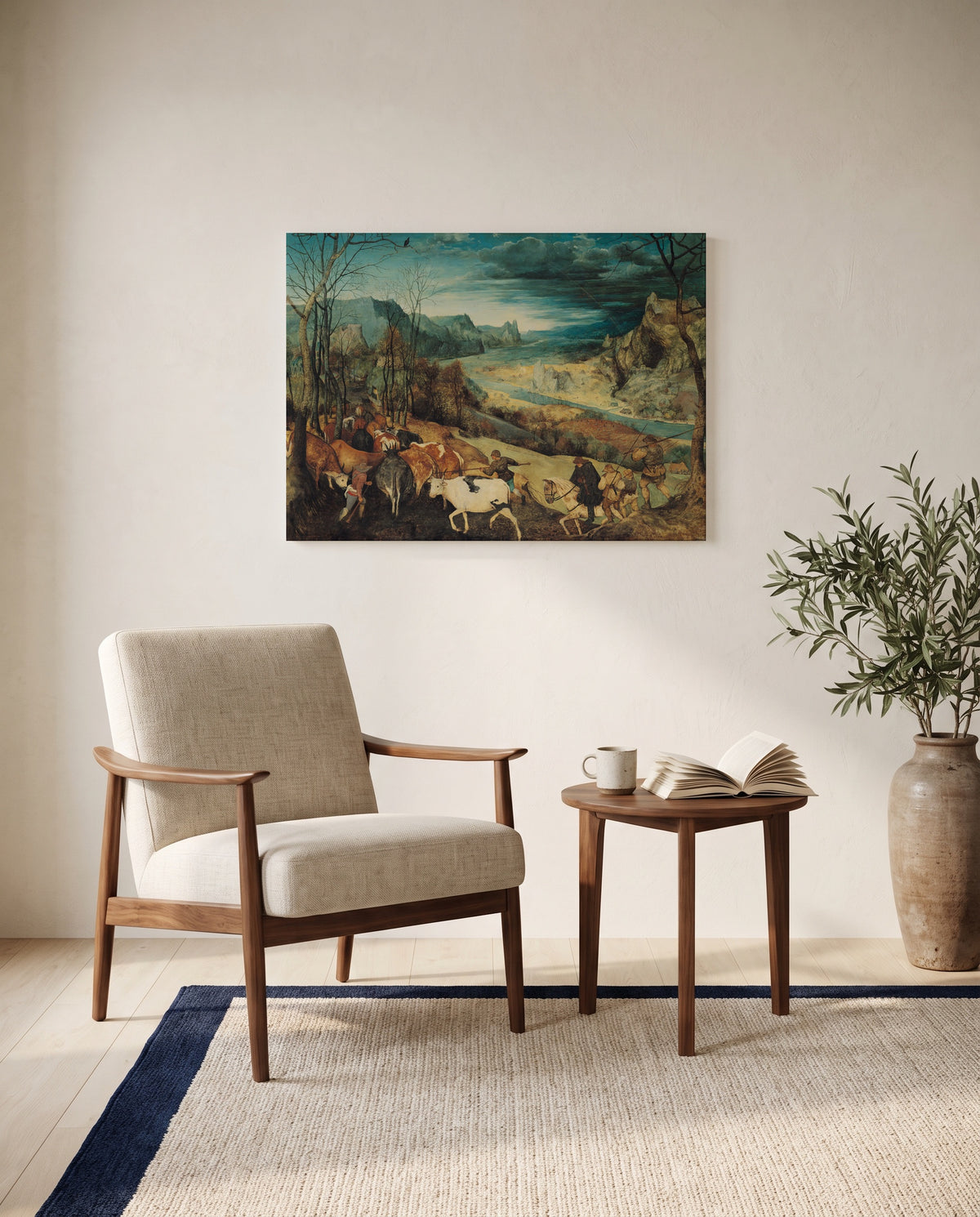 The Return of the Herd by Pieter Bruegel the Elder as a stretched canvas above a linen lounge chair in a reading corner