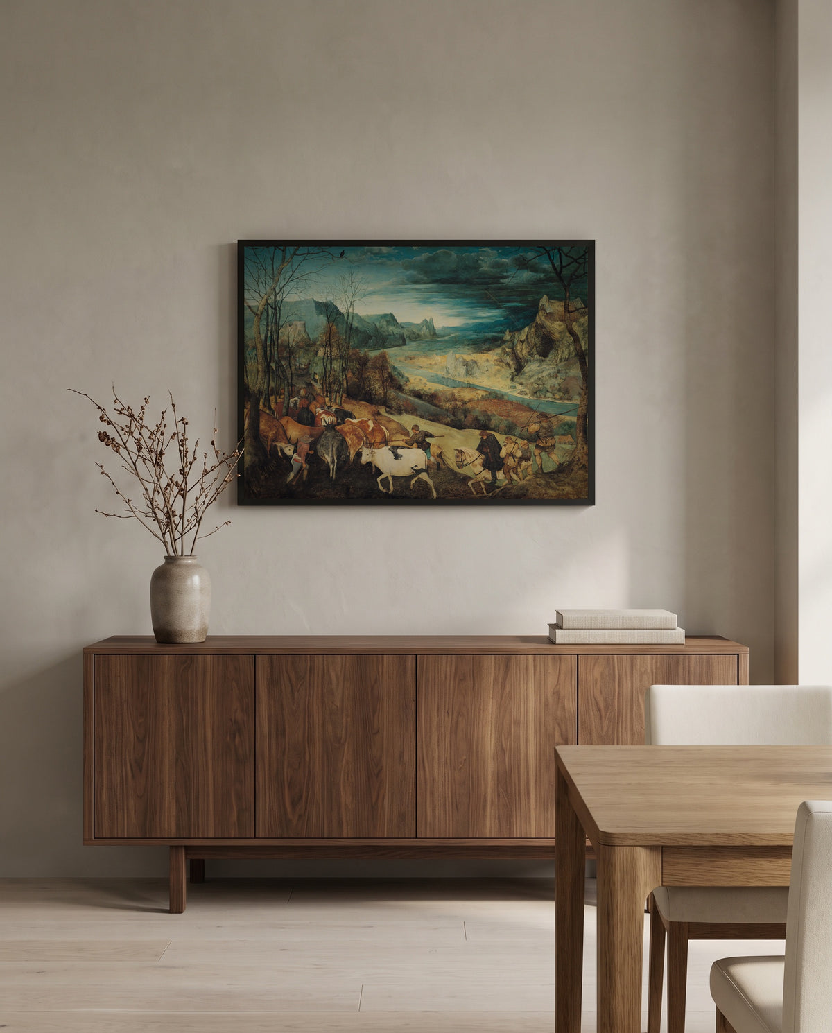 The Return of the Herd by Pieter Bruegel the Elder in a black frame above a walnut sideboard in a dining room