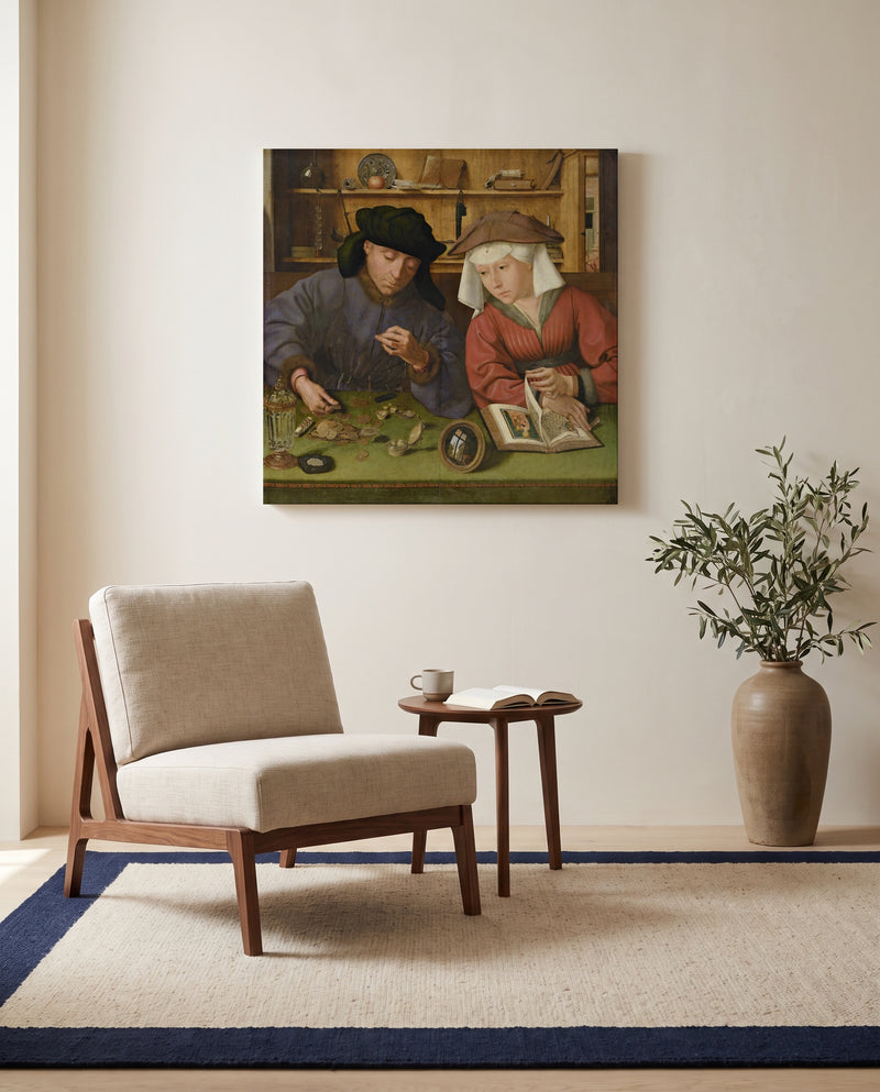 Moneylender and His Wife by Quentin Massys as a stretched canvas above a linen lounge chair in a reading corner