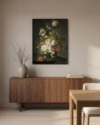 Flowers in a Glass Vase by Rachel Ruysch in a black frame above a walnut sideboard in a dining room
