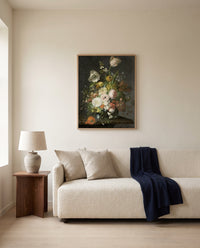 Flowers in a Glass Vase by Rachel Ruysch framed in natural oak above a cream sofa in a warm living room